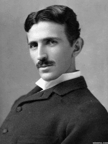 a black and white photo of a man with a mustache is taken by memeful.com