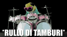 a pug wearing pink sunglasses is playing drums with the words " rullo di tamburi " written below it