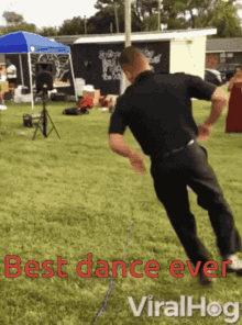 a man in a police uniform is dancing in a grassy field with the words " best dance ever " on the bottom