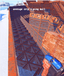 a person is holding a hammer in front of a wall that says average grip 's ping wall