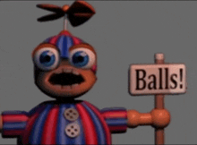 a cartoon character holds a sign that says balls