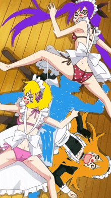 a group of anime girls are laying on the floor and one of them has a mask on her face