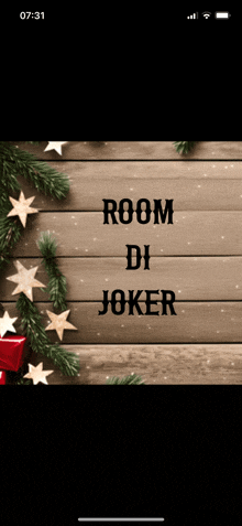 room di joker is written on a wooden board