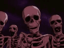 a group of skeletons are standing next to each other in a dark room with their mouths open .