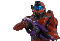 a man in a red helmet is holding a purple rifle