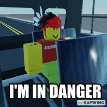 a roblox character with a red shirt that says roblox on it