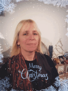 a woman wearing a merry christmas shirt