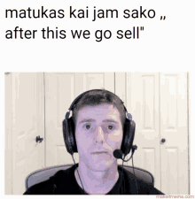 a man wearing headphones and a microphone says " matukar kai jam sako "