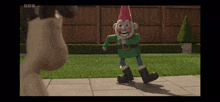 a gnome with a red hat is walking on a sidewalk with a bbc logo in the corner