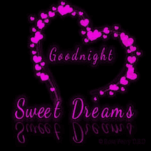 a heart shaped wreath of pink hearts with the words `` goodnight sweet dreams '' written inside of it on a black background .