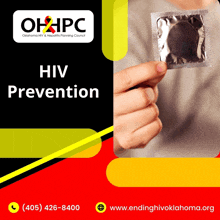 a person holding a condom with the words hiv prevention written on it