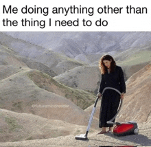 a woman is using a vacuum cleaner to clean a hillside