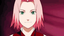 a girl with pink hair and green eyes is looking at the camera .