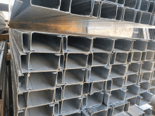 a stack of metal tubes stacked on top of one another