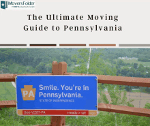 a sign that says smile you 're in pennsylvania is on a fence