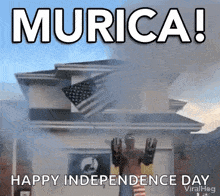 a man in a mask is standing in front of a house with an american flag on the roof and smoke coming out of it .