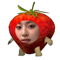 a strawberry with a girl 's face in it