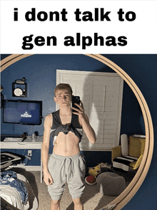 a man taking a selfie in front of a mirror with the words " i dont talk to gen alphas " above him