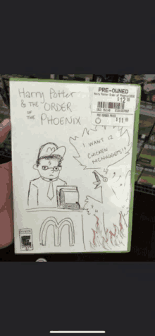 someone is holding a harry potter and the order of the phoenix dvd