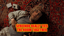 a man is laying on a rug with the words $friendo really ties the room together above him