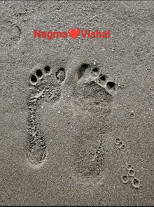 a footprint in the sand with the name magma vishal written on it