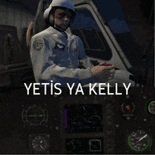 a man in a police uniform is sitting in the cockpit of a helicopter with the words yetis ya kelly below him