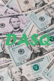 a pile of 20 dollar bills with dasq in green