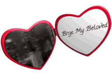 a heart shaped mirror with the words brgx my beloved on it