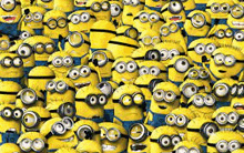 a bunch of minions are sitting next to each other on a blue surface .