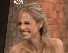 a woman is laughing with the hashtag #ddm on the bottom