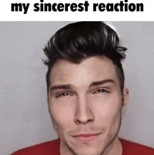 a close up of a man 's face with the words `` my sincerest reaction '' written above it .