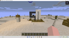 a screenshot of a minecraft game shows a house in the desert