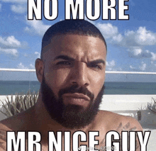 a man with a beard has the caption no more mr nice guy on his face