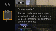 a screen that says programmed ae and a button that says ok