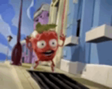 a cartoon character of a tomato with big eyes is standing on a sidewalk .