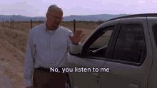 a man standing next to a car with the words " no you listen to me " on the bottom