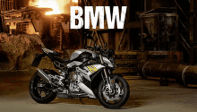 a bmw motorcycle is parked in a warehouse