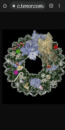 a picture of a christmas wreath on a phone screen