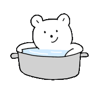 a bear is taking a bath in a pot of water .