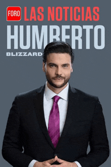 a man in a suit and tie stands in front of a sign that says las noticias humberto blizzard