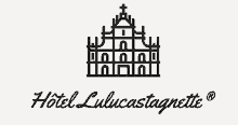 a black and white logo for hotel lulucastagnette with a castle on it .