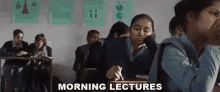 a group of students are sitting at their desks in a classroom with the words morning lectures written on the bottom .