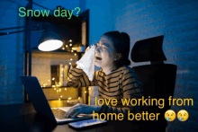 a woman crying in front of a laptop with the words snow day i love working from home better