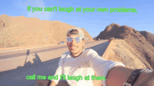 a man taking a selfie with mountains in the background