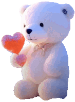 a white teddy bear holding a pink heart