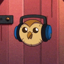 a cartoon owl wearing headphones on a pink wall .