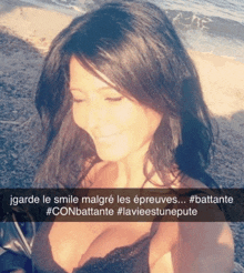 a picture of a woman with a caption that says " garde le smile malgre les epreuves "