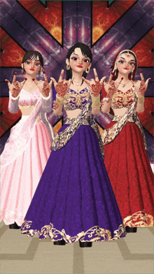 a group of three women standing next to each other with their hands up