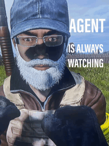 a man with a beard wearing glasses and a hat with agent is always watching written on the bottom