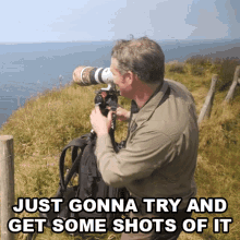 a man is taking a picture of the ocean with a caption that says just gonna try and get some shots of it